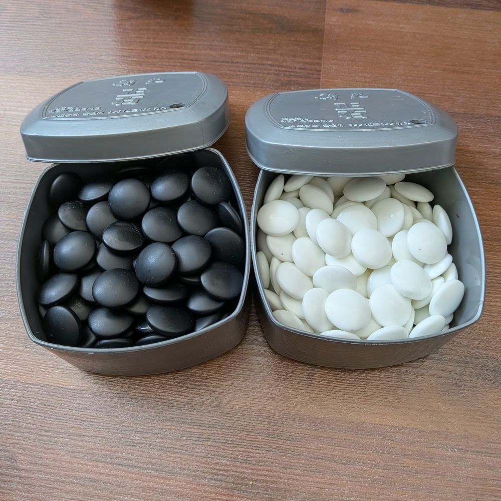 Black and White Stone Set in Metal Tins